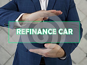REFINANCE CAR phrase on the screen.  RefinancingÂ aÂ carÂ loan involves taking on a new loan to pay off the balance of your